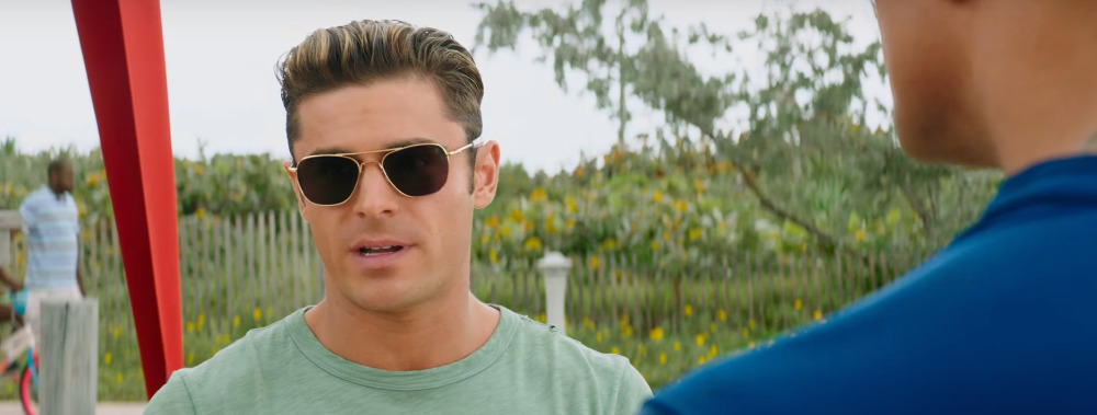 Zac Efron wearing sunglasses in Baywatch